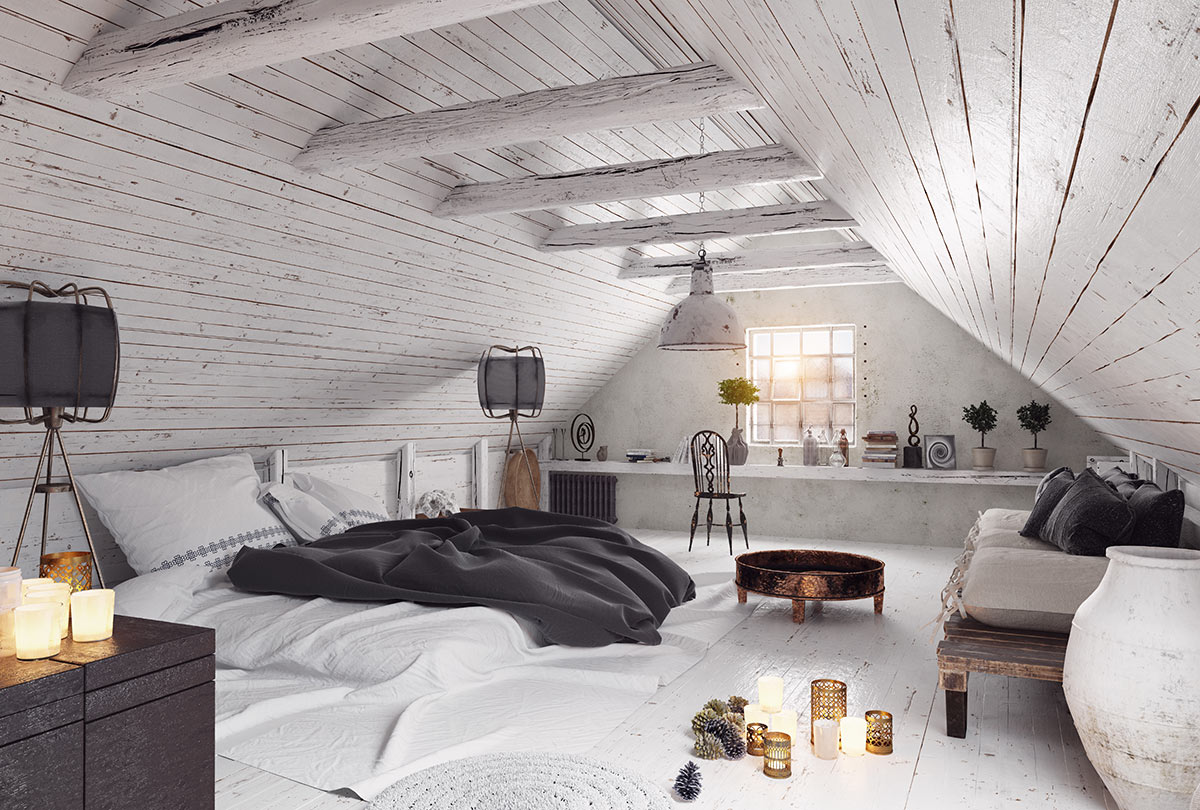 Splendida camera da letto in una mansarda con pareti e travi in legno bianco.
