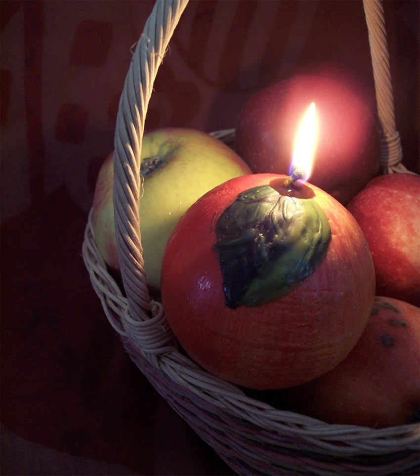 candela profumata a forma di mela