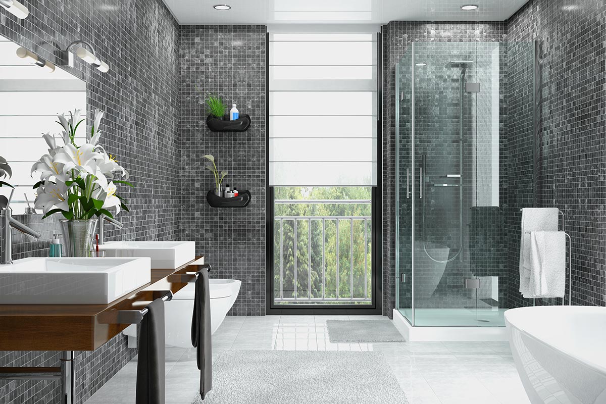 Bagni moderni con rivestimento piastrelle mosaico grigio antracite.